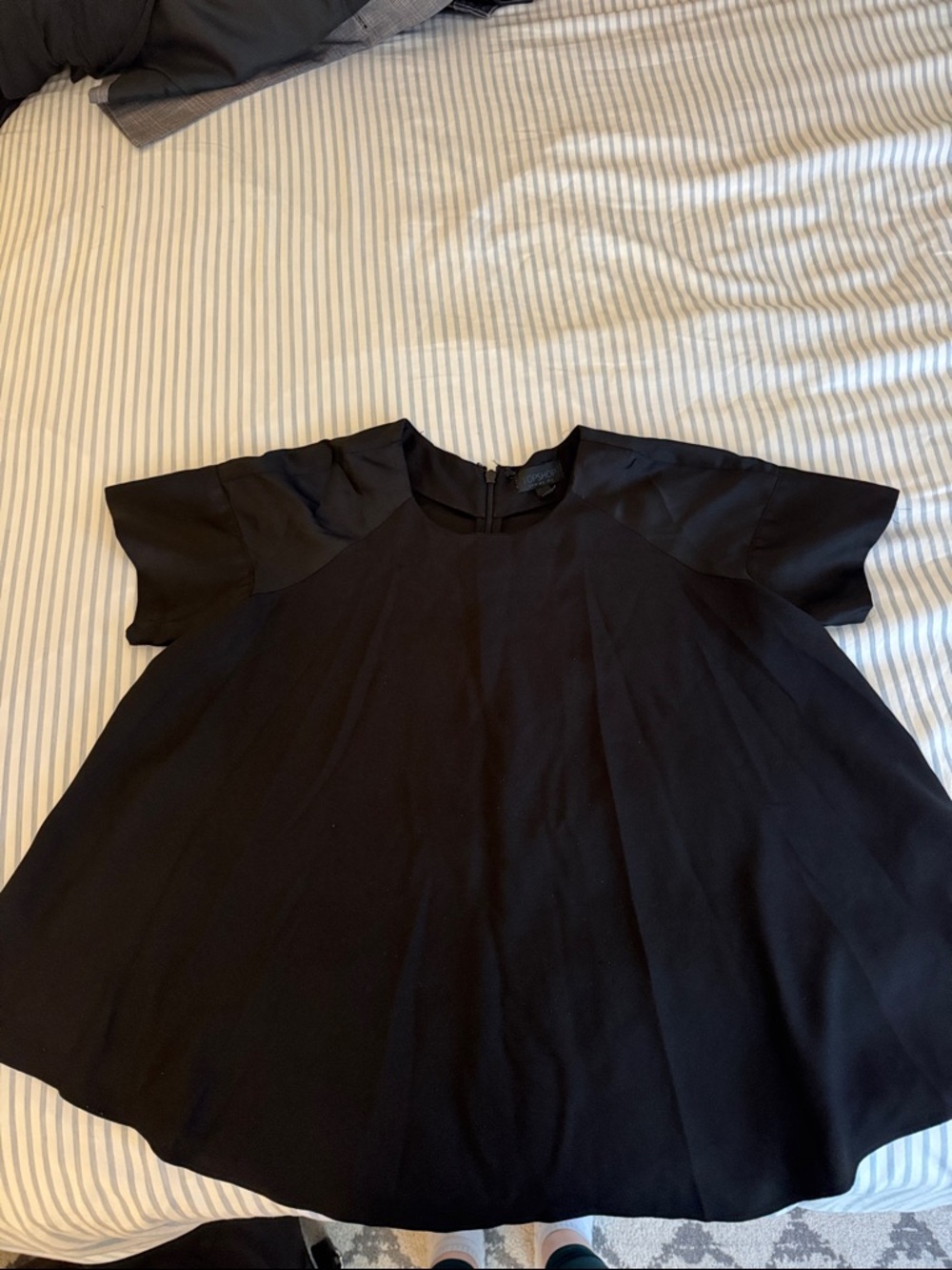 Black Women's Short Sleeve Swing Top. Really fun and flattering